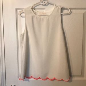 White tank top with scalloped detail on bottom